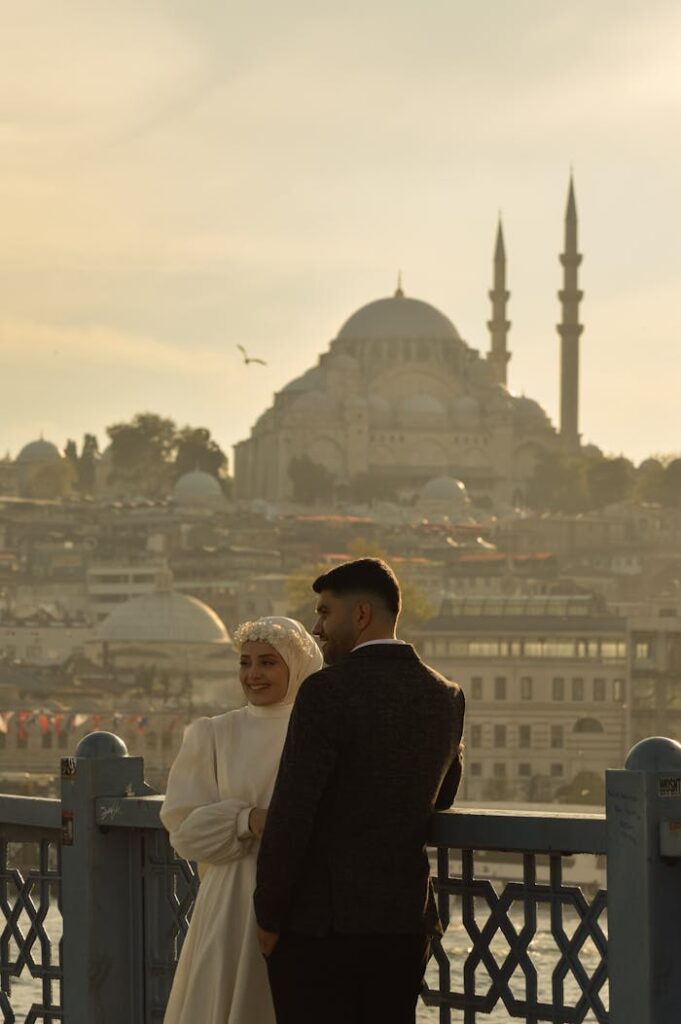 Couple at Galata Bridge with Mosque in Background